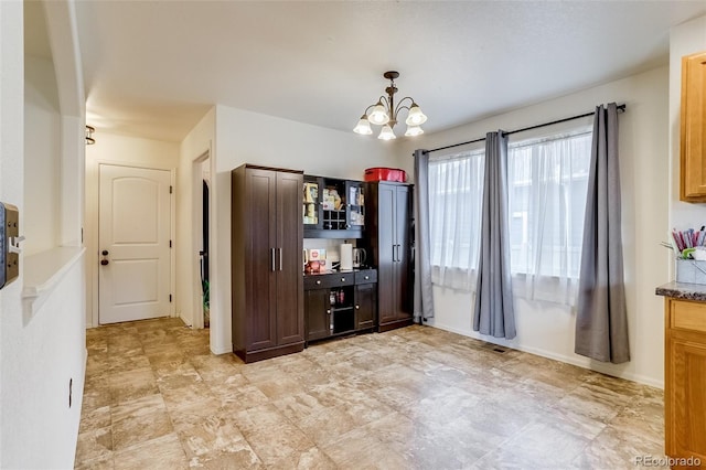 5770 Waverley Ave, Firestone, CO 80504 - dining area with a chandelier