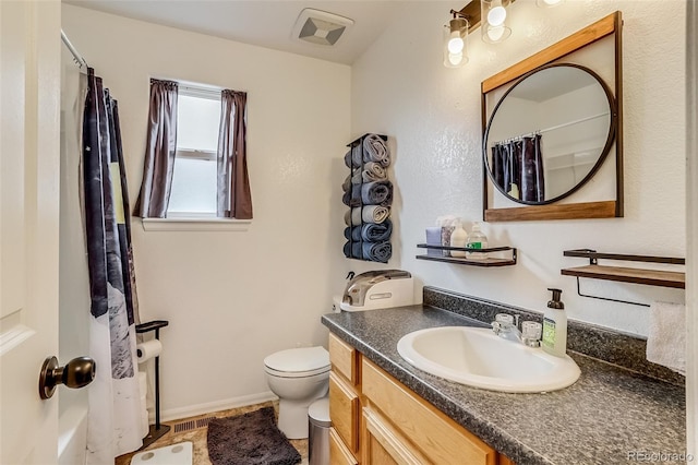 5770 Waverley Ave, Firestone, CO 80504 - bathroom featuring toilet, a shower with shower curtain, and vanity