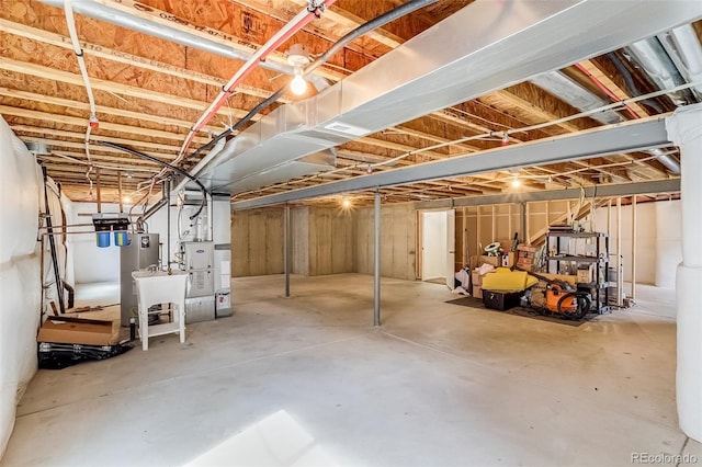 5770 Waverley Ave, Firestone, CO 80504 - unfinished basement featuring heating unit and a sink