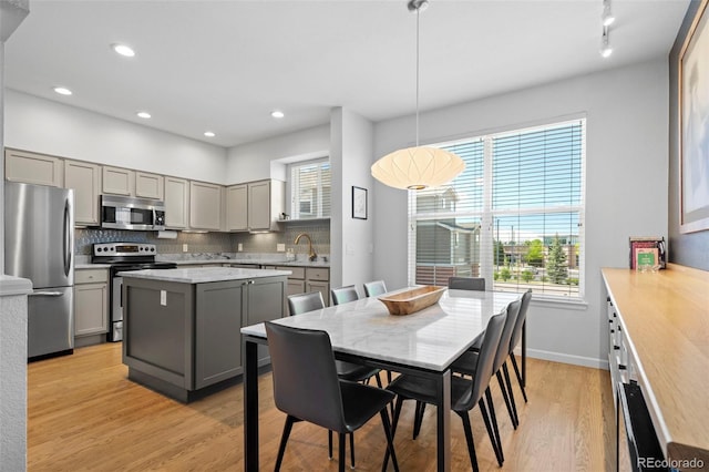 84 Spruce St Unit 707, Denver, CO 80230 - dining area with light wood-style floors, recessed lighting, and baseboards
