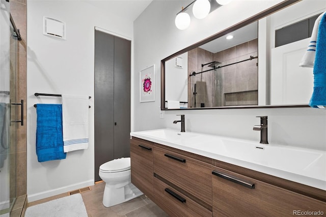 84 Spruce St Unit 707, Denver, CO 80230 - full bath with a shower stall, double vanity, toilet, baseboards, and tile patterned flooring
