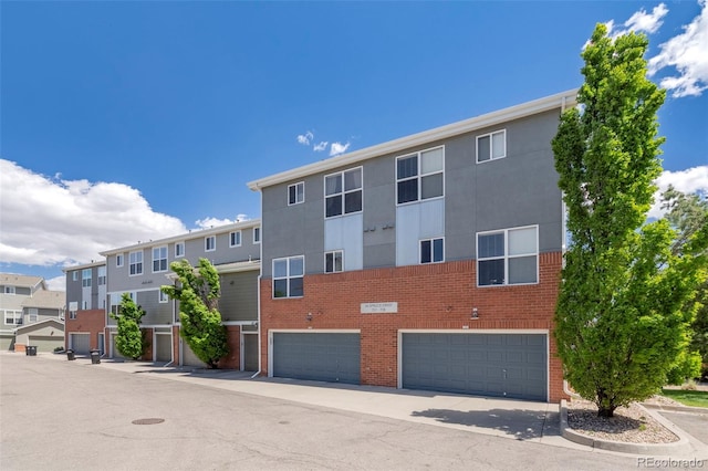 84 Spruce St Unit 707, Denver, CO 80230 - view of property with an attached garage