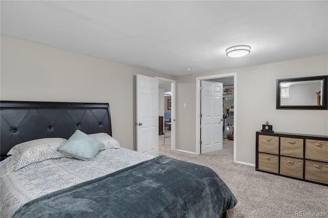 bedroom with light colored carpet