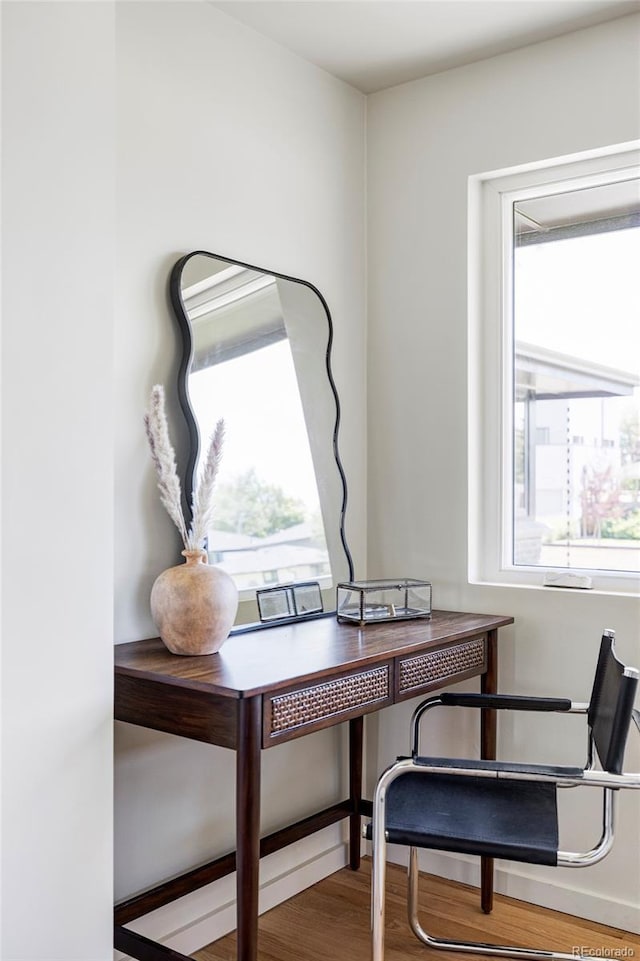 office space with wood finished floors and a wealth of natural light