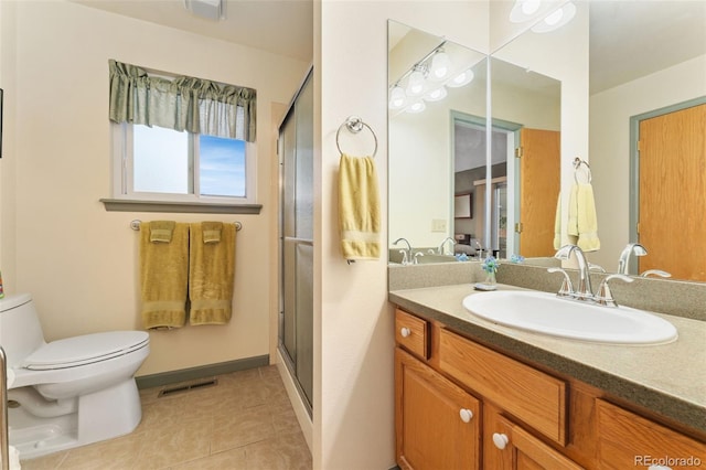 12906 Cherry Way, Thornton, CO 80241 - full bathroom with vanity, a shower stall, and tile patterned floors