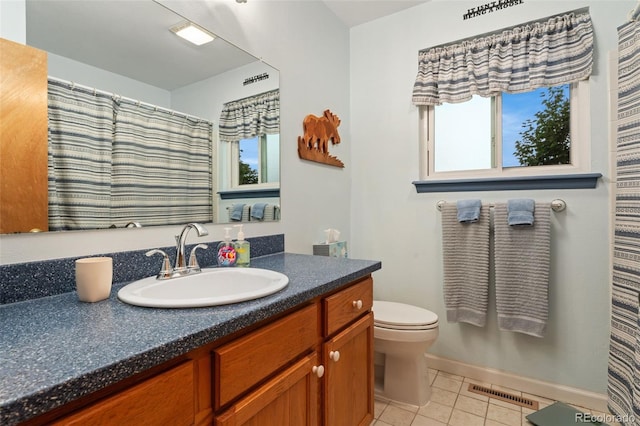 12906 Cherry Way, Thornton, CO 80241 - full bath featuring tile patterned floors and vanity