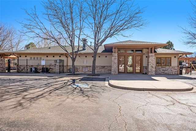 3751 W 136th Ave Unit S3, Broomfield, CO 80023 - back of house with stucco siding and stone siding