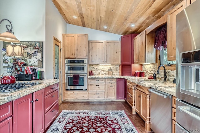 kitchen featuring backsplash, appliances with stainless steel finishes, wood ceiling, vaulted ceiling, and a sink