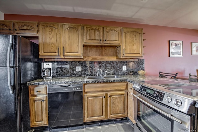 94300 Ryan Gulch Rd Unit 301, Silverthorne, CO 80498 - kitchen with black appliances, a sink, decorative backsplash, tile patterned flooring, and tile counters