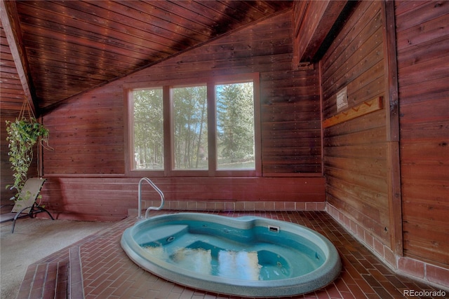 94300 Ryan Gulch Rd Unit 301, Silverthorne, CO 80498 - bathroom featuring lofted ceiling, wood walls, and wooden ceiling