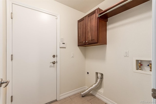 laundry room featuring hookup for an electric dryer, baseboards, light tile patterned floors, cabinet space, and hookup for a washing machine