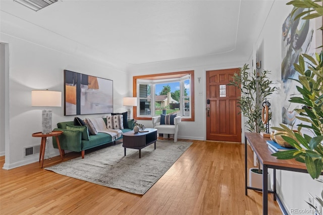 6755 W 45th Ave, Wheat Ridge, CO 80033 - living room with light wood-style flooring and baseboards