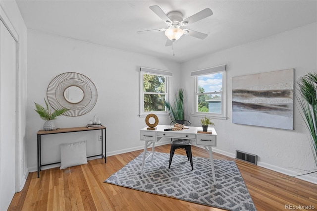 6755 W 45th Ave, Wheat Ridge, CO 80033 - office space featuring wood finished floors and ceiling fan
