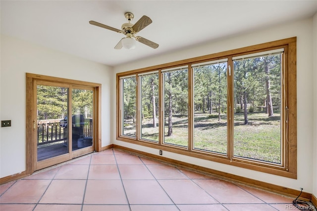18247 State Highway 7, Lyons, CO 80540 - unfurnished sunroom with baseboards and tile patterned flooring