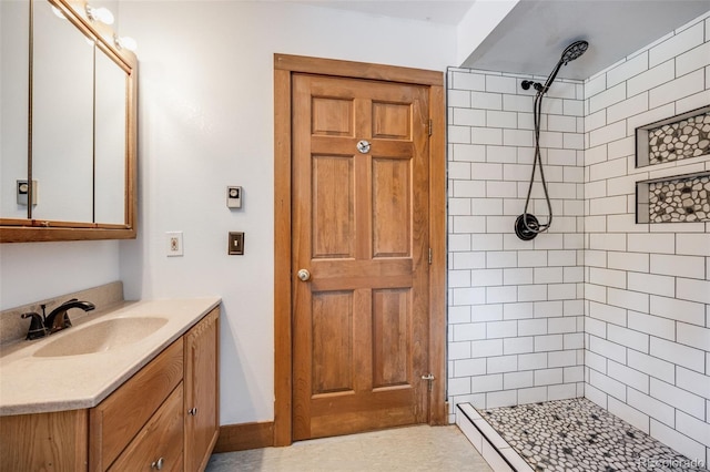 18247 State Highway 7, Lyons, CO 80540 - full bathroom featuring a tile shower and vanity