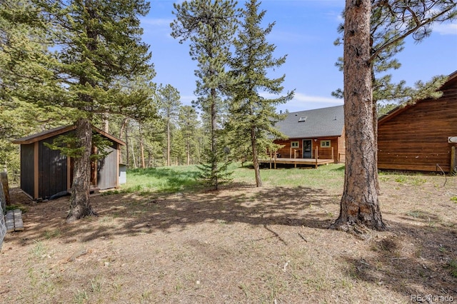 18247 State Highway 7, Lyons, CO 80540 - view of yard featuring a deck