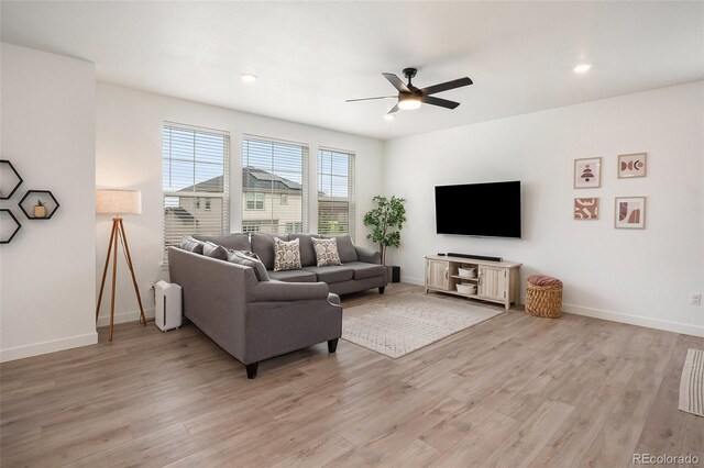 14818 Dahlia St, Thornton, CO 80602 - living room with a ceiling fan, light wood-style flooring, and recessed lighting