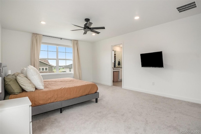14818 Dahlia St, Thornton, CO 80602 - bedroom featuring recessed lighting, light carpet, ensuite bathroom, and ceiling fan