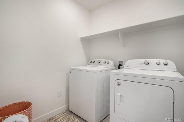 14818 Dahlia St, Thornton, CO 80602 - laundry room with independent washer and dryer and baseboards