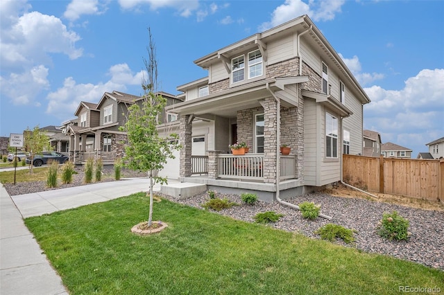 14818 Dahlia St, Thornton, CO 80602 - prairie-style house featuring a porch, stone siding, concrete driveway, a garage, and a residential view