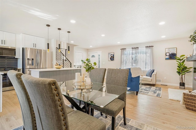 dining area featuring light hardwood / wood-style floors