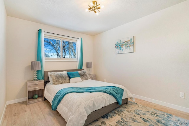 bedroom featuring light hardwood / wood-style floors