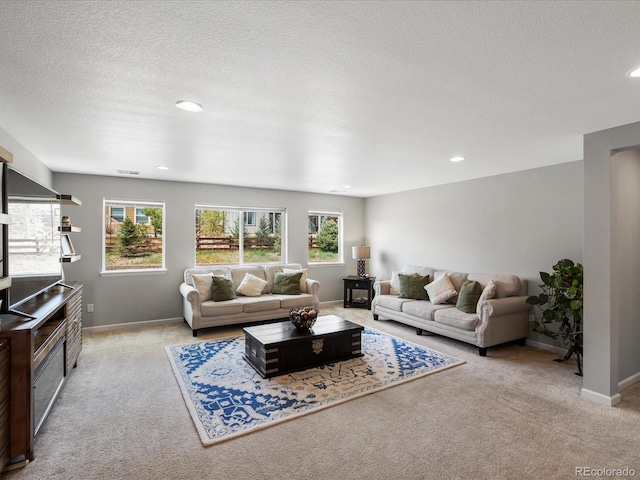 13041 Reata Ridge Dr, Parker, CO 80134 - carpeted living room with recessed lighting, baseboards, visible vents, and a textured ceiling