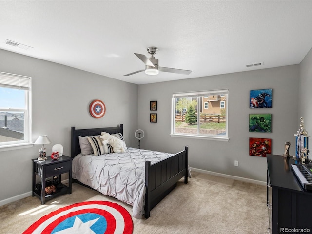 13041 Reata Ridge Dr, Parker, CO 80134 - bedroom with baseboards, light carpet, and visible vents