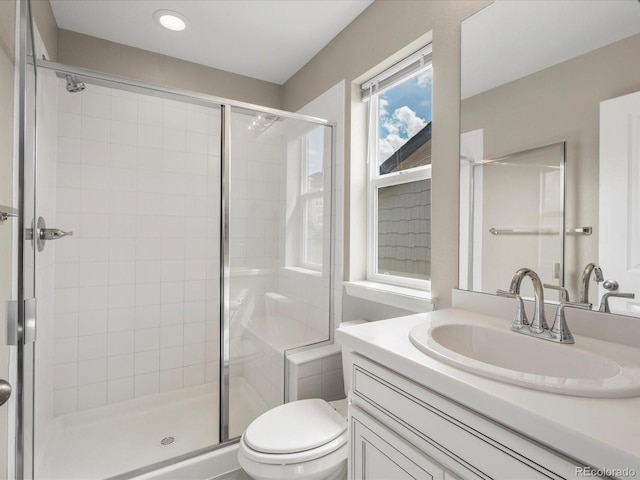 13041 Reata Ridge Dr, Parker, CO 80134 - full bathroom with vanity, recessed lighting, toilet, and a shower stall
