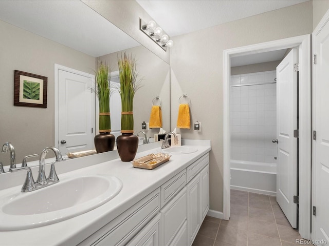 13041 Reata Ridge Dr, Parker, CO 80134 - bathroom featuring a sink, tile patterned flooring, and double vanity