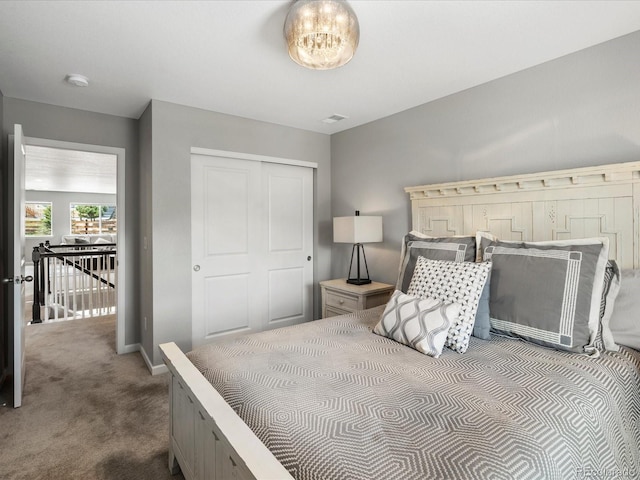 13041 Reata Ridge Dr, Parker, CO 80134 - carpeted bedroom with baseboards and a closet