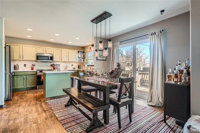 dining room featuring light hardwood / wood-style floors