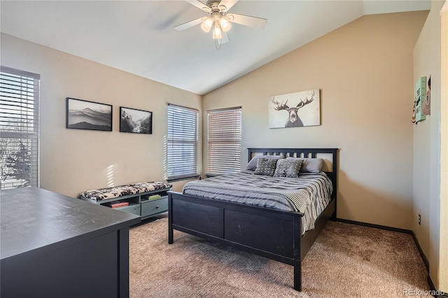 carpeted bedroom featuring ceiling fan and lofted ceiling