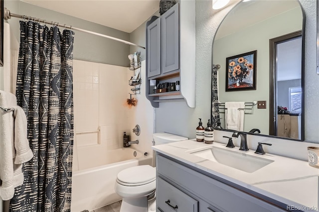 full bathroom with shower / bath combination with curtain, vanity, and toilet