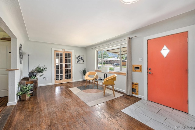 1666 S Bryant St, Denver, CO 80219 - entryway with wood finished floors, baseboards, and french doors