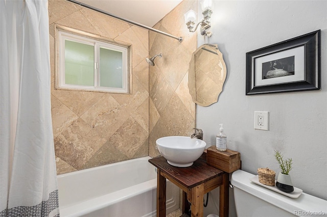 1666 S Bryant St, Denver, CO 80219 - bathroom with a sink, shower / tub combo with curtain, and toilet
