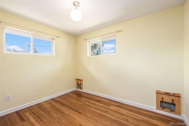 1666 S Bryant St, Denver, CO 80219 - unfurnished room with baseboards and wood finished floors