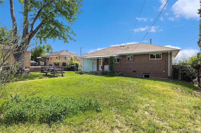 1666 S Bryant St, Denver, CO 80219 - rear view of house with brick siding