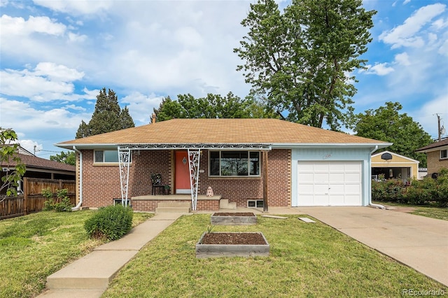 1666 S Bryant St, Denver, CO 80219 - view of front facade with brick siding, a garage, driveway, and roof with shingles