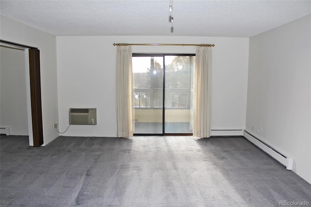 unfurnished room featuring carpet, a textured ceiling, a wall mounted air conditioner, and a baseboard heating unit