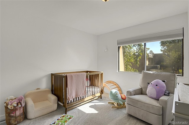 7995 E Mississippi Ave Unit K3, Denver, CO 80247 - bedroom featuring a nursery area and carpet floors