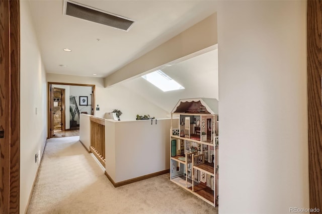 hall featuring lofted ceiling with beams, light colored carpet, an upstairs landing, baseboards, and visible vents