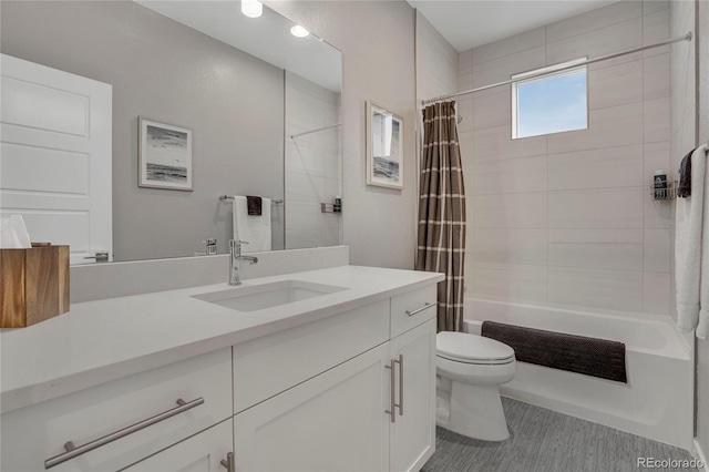 bathroom featuring vanity, shower / bathtub combination with curtain, and toilet