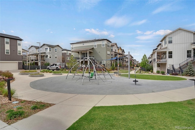 community jungle gym featuring a residential view