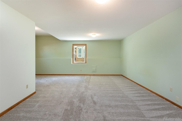 6668 Fairways Dr, Longmont, CO 80503 - carpeted spare room with baseboards