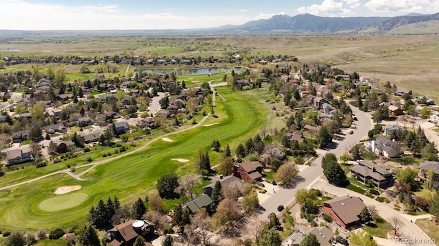 6668 Fairways Dr, Longmont, CO 80503 - aerial view of property's location featuring a water and mountain view, a local golf course, and nearby suburban area