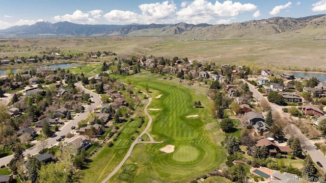 6668 Fairways Dr, Longmont, CO 80503 - aerial view of property's location with a water and mountain view, a local golf course, and nearby suburban area
