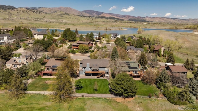 6668 Fairways Dr, Longmont, CO 80503 - aerial view of residential area featuring a water and mountain view
