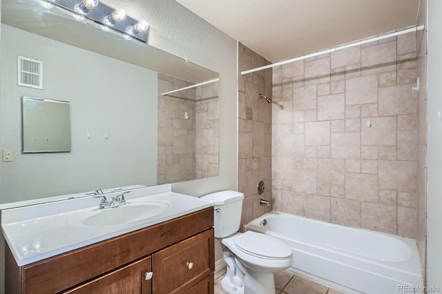 full bathroom featuring vanity, toilet, tile patterned floors, and  shower combination