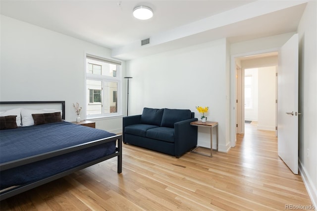 bedroom featuring light hardwood / wood-style floors